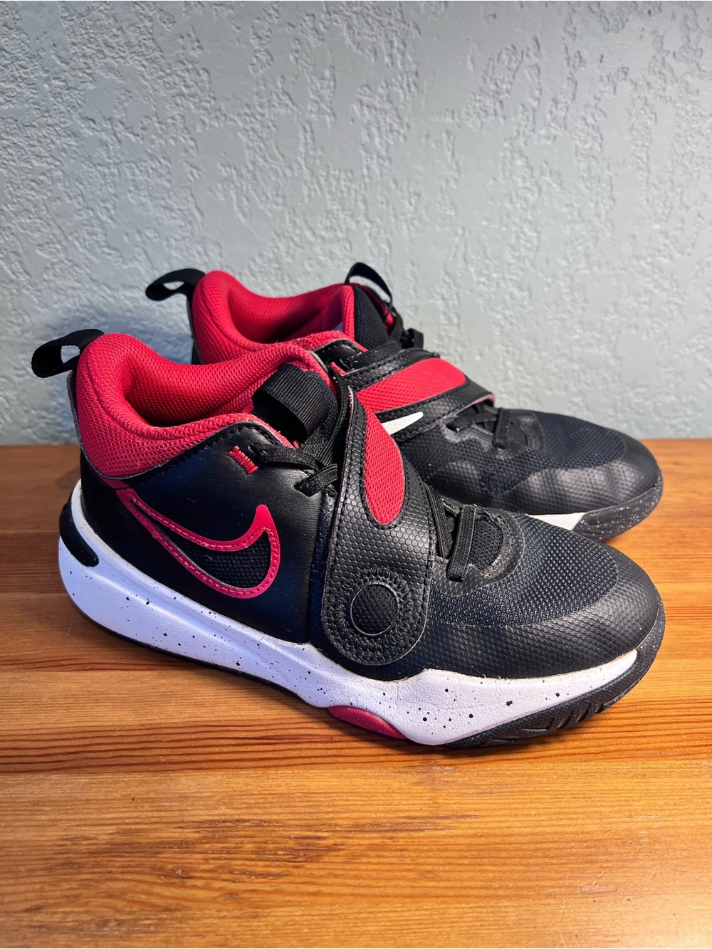 Nike Team Hustle D11 Kids Black and Red Low-Top Sneakers, Youth 4 size